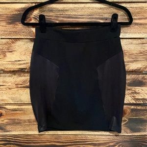 H&M black pencil skirt with faux leather inserts. Size 6.